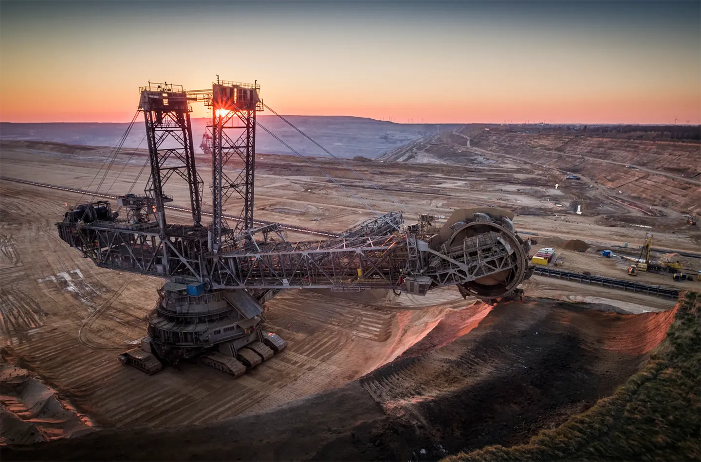 Image of a bucket-wheel excavator in an open cast mining area